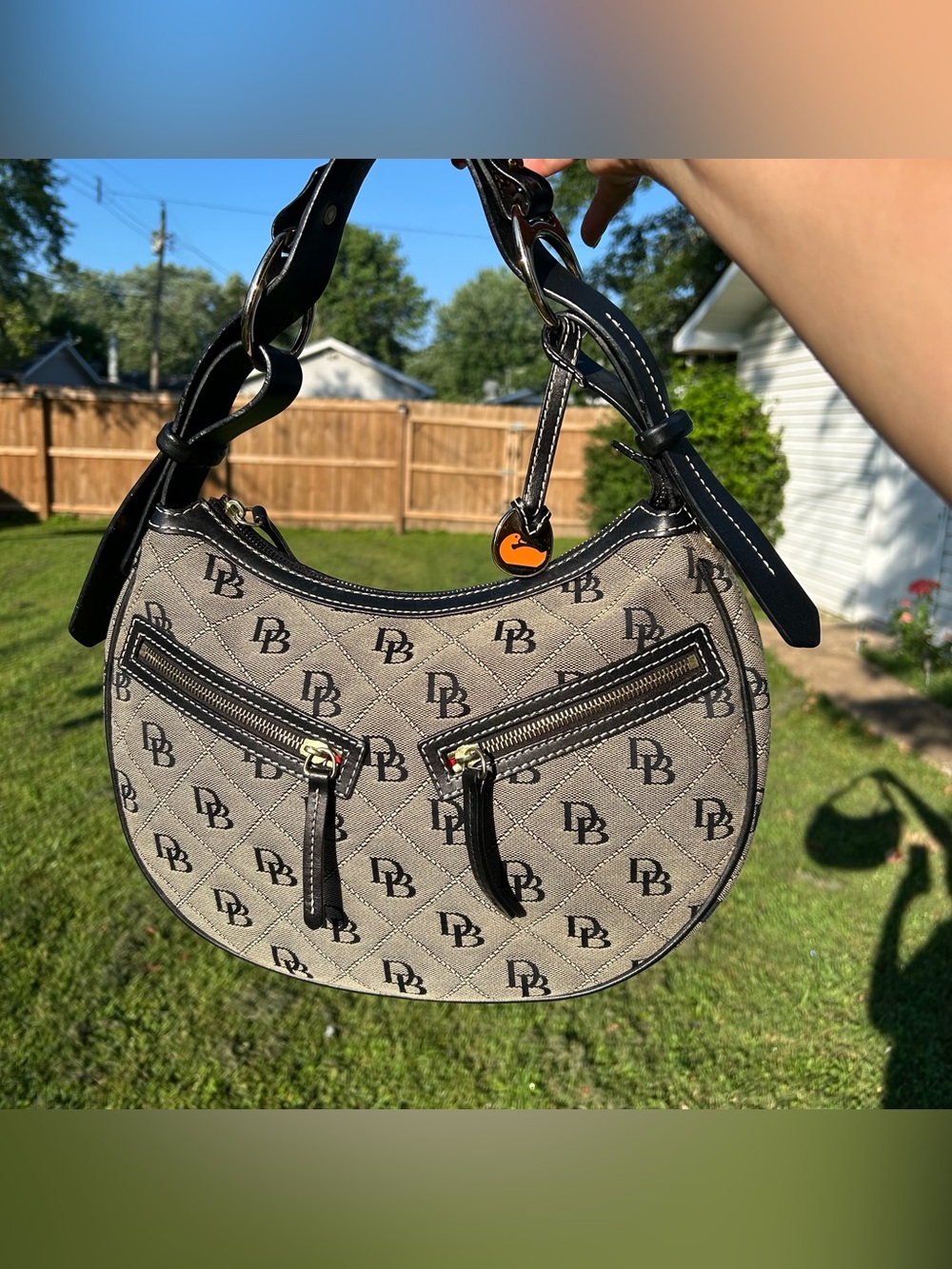 Dooney & Bourke Tan and Black DB Logo Crescent Shoulder Bag